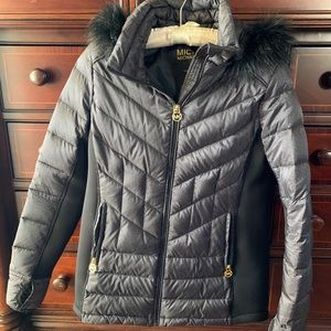 Black w/ grayish design Michael Kors jacket, faux fur collar with stretch sides.